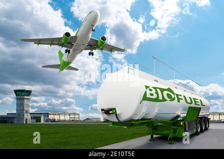 Airplane and bioguel tank trailer on the background of airport. New energy sources Stock Photo