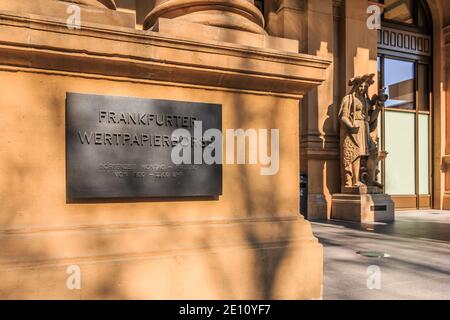 Entrance to the building with metal plaque of the German Stock Exchange in Frankfurt. Historic baroque house with arches, columns and figure. Steps in Stock Photo