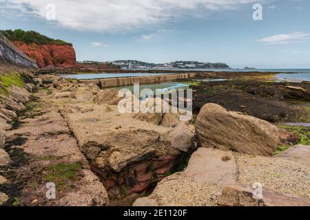 View from the Preston Sands in Paignton, Torbay, England, UK - with Torquay in the background Stock Photo