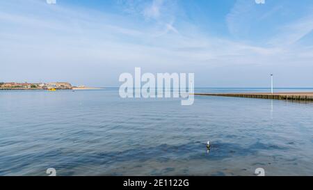 The ferry pier in Knott End-on-Sea, Lancashire, England, UK - with the River Wyre and Fleetwood in the background Stock Photo