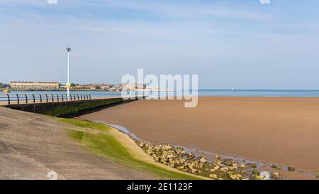 The ferry pier in Knott End-on-Sea, Lancashire, England, UK - with the River Wyre and Fleetwood in the background Stock Photo