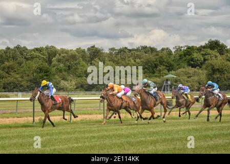 Magdeburg, Germany - 24 June 2017: Horse race. Tough fight between the jockeys riding race horses Stock Photo