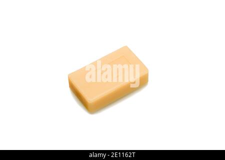 A large bar of seventy-two percent laundry soap. Isolate over white background. Close-up. Stock Photo