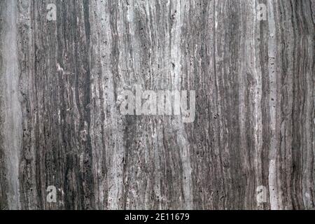 Artificial stone backdrop is similar to natural. It can look like onyx or marble or granite or any other black stone. Close-up. Stock Photo
