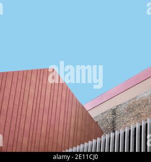 Geometric lines and shapes of modern architecture against blue sky, abstract architectural feature with copy space on top Stock Photo
