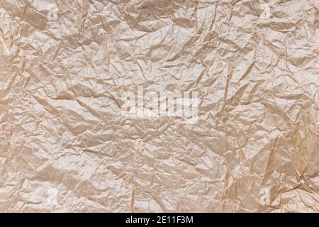 Crumpled brown kraft paper texture background Stock Photo