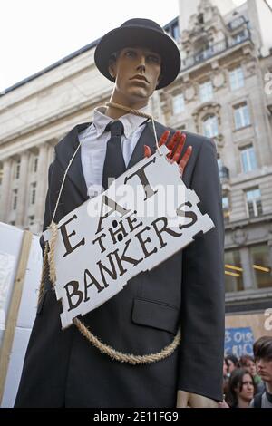 GREAT BRITAIN / England / London / A mannequin dressed as a banker is hanged from traffic light post outside the Bank of England . Stock Photo