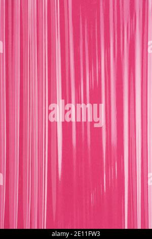 Cling film folds texture, plastic, vinyl pink striped background. Stock Photo