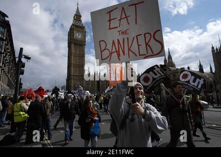 GREAT BRITAIN / England / London /A protester holds a sing 'Eat the Bankers' on March 28, 2009 in London, England. Stock Photo