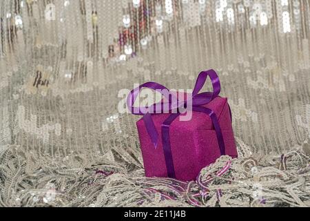 little pink gift on a silver background. high quality Stock Photo