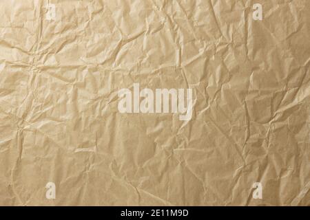 Abstract texture. Crumpled craft brown paper background. Copy space. Horizontal. DIY, handicraft, back to school, ecology, plastic free concept, harve Stock Photo
