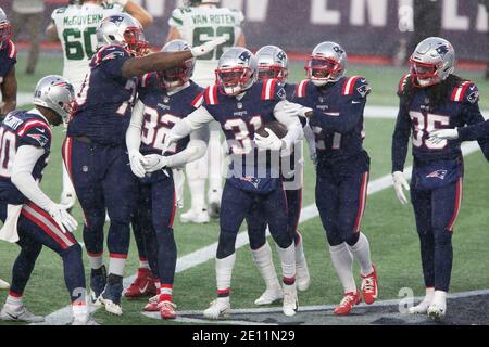 The New England Patriots, wearing their throwback uniforms, and the Detroit  Lions line up for the snap at the line of scrimmage during an NFL football  game at Gillette Stadium, Sunday, Oct.