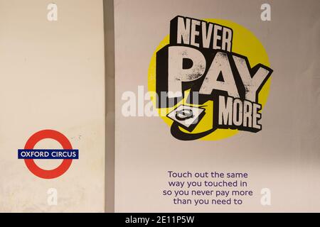 A contactless payment poster on the platform at Oxford Circus London Underground Station. London Stock Photo