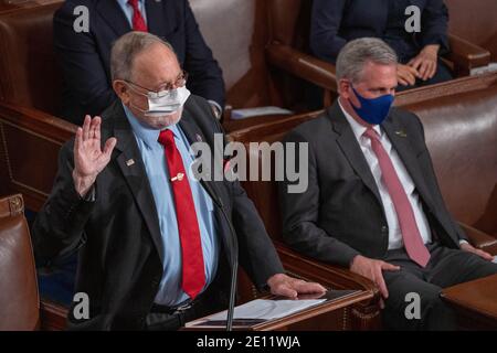 Washington, United States. 03rd Jan, 2021. U.S. Rep. Don Young (R-AK), stands and swears-in Speaker of the House Nancy Pelosi, (D-CA) at the opening of the new 117th Congress on January 3, 2021 in Washington DC. Photo by Ken Cedeno/Sipa USA Credit: Sipa USA/Alamy Live News Stock Photo