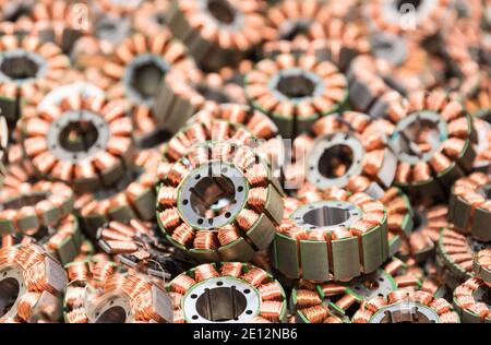 Numerous Rotors Of An Electric Motor Show Copper Wire Windings Stock Photo
