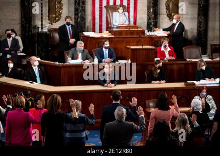 Washington, United States Of America. 03rd Jan, 2021. Speaker of the United States House of Representatives Nancy Pelosi (Democrat of California), swears in members of the 117th Congress on the House floor in the Capitol on Sunday, January 3, 2021. Credit: Bill Clark/Pool via CNP | usage worldwide Credit: dpa/Alamy Live News Stock Photo