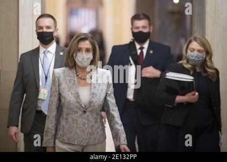 Washington, United States. 03rd Jan, 2021. Speaker of the United States House of Representatives Nancy Pelosi (Democrat of California) walks from the House chamber to her office at the U.S. Capitol as the 117th Congress convenes in Washington, DC, Sunday, January 3, 2021. Photo by Rod Lamkey/CNP/ABACAPRESS.COM Credit: ABACAPRESS/Alamy Live News Stock Photo