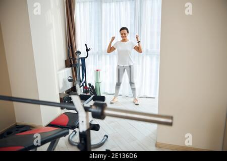 Sporty young woman enjoying her morning workout Stock Photo