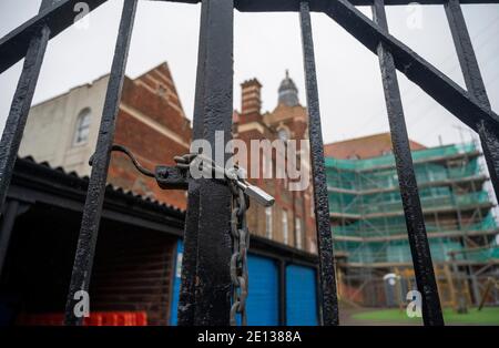 Brighton UK 4th January 2021 - It's quiet outside St Luke's Primary School in Brighton after the Brighton & Hove City Council advised primary schools in the city to remain closed and move to remote online learning until the 18th January  : Credit Simon Dack / Alamy Live News Stock Photo