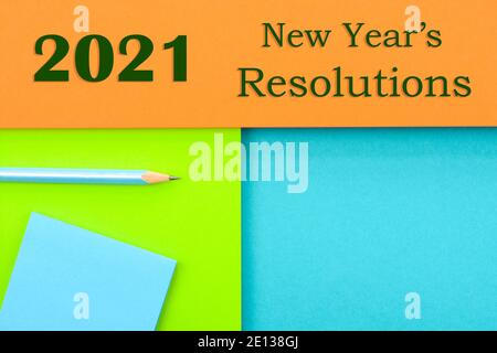 2021 New year's resolutions text on a multicolored background Stock Photo