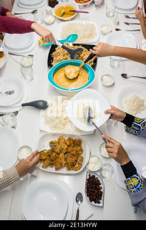 Top view of friends having lunch Stock Photo