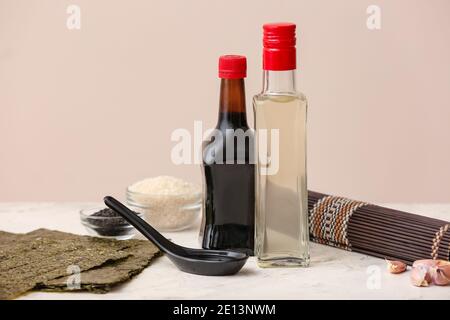 Composition with rice vinegar  on table Stock Photo