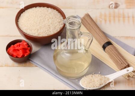 Composition with rice vinegar  on table Stock Photo
