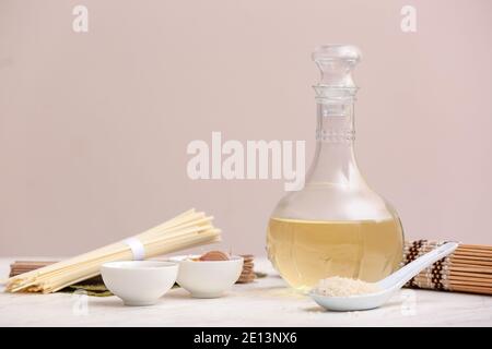 Composition with rice vinegar  on table Stock Photo