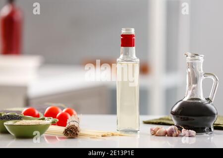 Composition with rice vinegar  on table Stock Photo