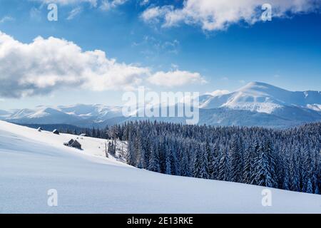 Winter landscape with huts in the mountain highland Stock Photo