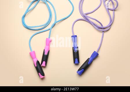 Jumping ropes on light background Stock Photo