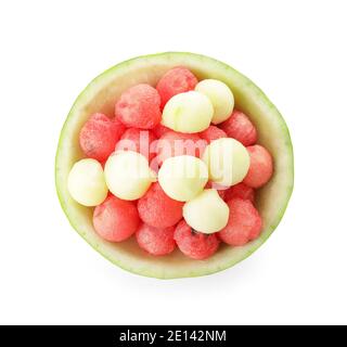 Tasty watermelon balls in ripe watermelon on white background Stock Photo