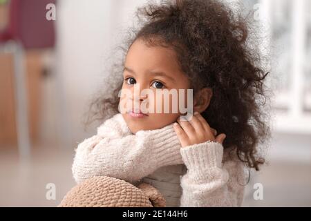 Cute African-American baby girl at home Stock Photo