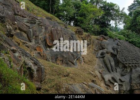 Sculptures carved into the rock at the archaeological site of Unakoti in the state of Tripura. India. Stock Photo