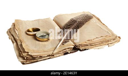 Old book with compass and feather on white background Stock Photo