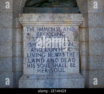 Rhodes Memorial- Cape Town, South Africa - 16/12/2020 Rusty, green Cecil Rhodes statue. 'His soul shall be her soul' quote engraved bellow. Stock Photo