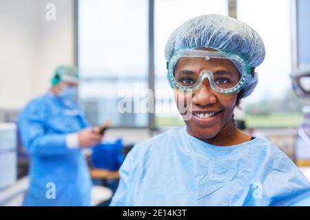 African researcher works in the laboratory on vaccine against Covid-19 and coronavirus Stock Photo