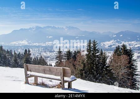 This Rest Bench Invites You To Enjoy The Magnificent View Of The Isarwinkel Stock Photo