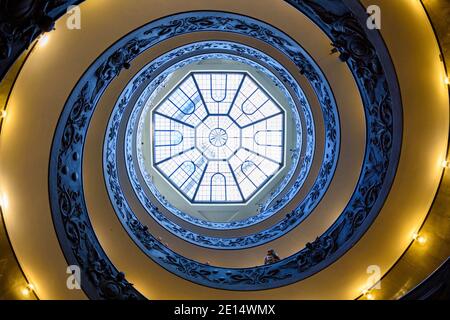 Rome. Italy. The modern Bramante spiral staircase (1932) in the Vatican Museums, view from the bottom looking up. The double helix staircase was desig Stock Photo