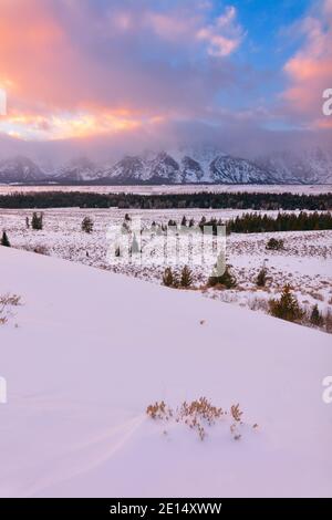 Scenic winter view of the Teton range at sunset from the Snake River Overlook in Grand Teton National Park, Wyoming, USA Stock Photo