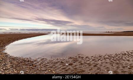 Tidal pool on Prestatyn Beach, North Wales Stock Photo