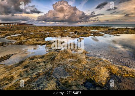 Low hanging clouds prior to sunrise in the lower Florida Keys Stock Photo