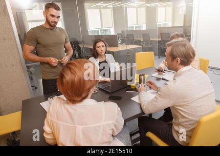Corporate businessteam having brainstorming meeting at modern office Stock Photo