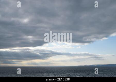Dramatic Clouds and Rays Over the Sea, Seen from the Isle of Portland, Dorset Stock Photo