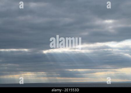 Dramatic Clouds and Rays Over the Sea, Seen from the Isle of Portland, Dorset Stock Photo