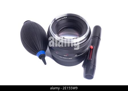 Air blower with camera lens and lens cleaner pen Isolated on a white background. Stock Photo