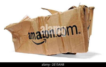 Damaged Amazon package photographed on a white background Stock Photo