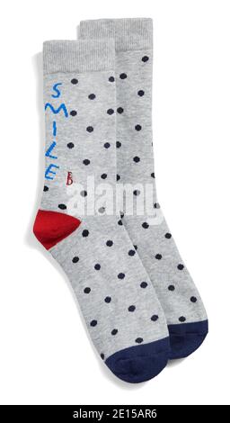 ED by Ellen Smile  gray and blue polka dot socks photographed on a white background Stock Photo