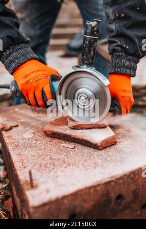 Professional installation of tiles on glue - high quality exterior finishing works Stock Photo