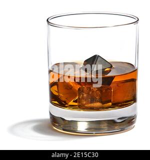 ice cube gems in whisky designed by Anna Rabinowicz photographed on a white background Stock Photo